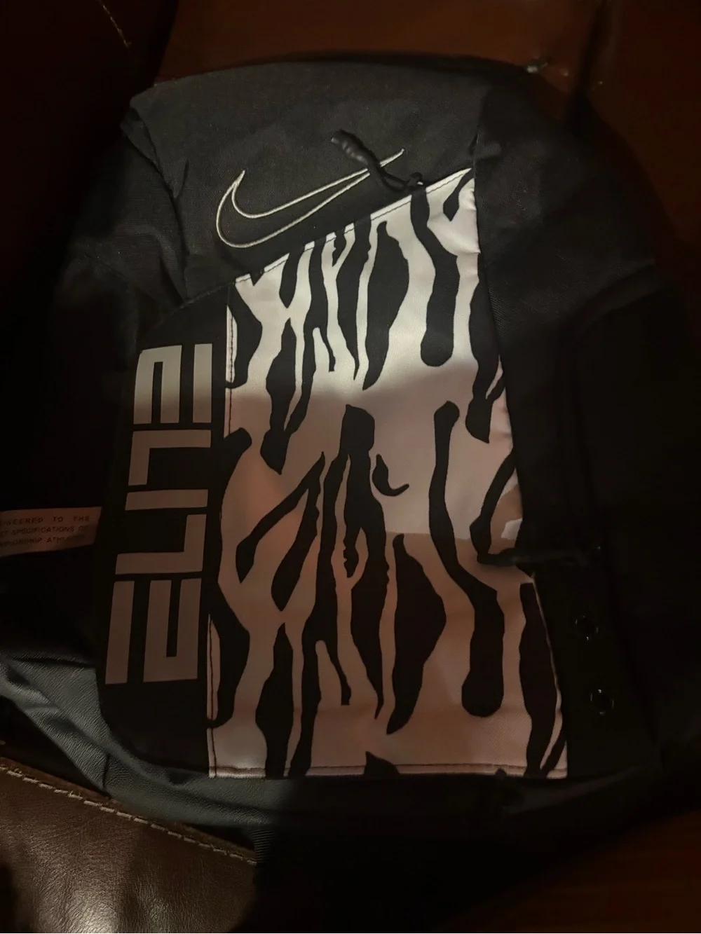 Nike Men's Black and White Zebra Print Elite Jacket-Style Backpack